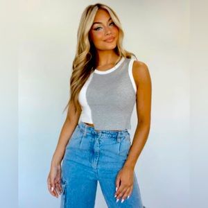 Papermoon indifferent to it cropped tank.